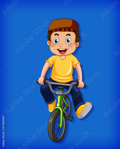 Happy muslim boy riding bicycle