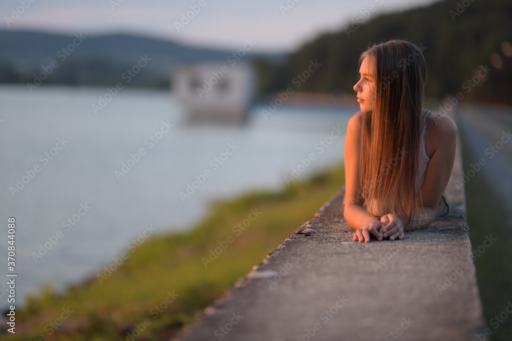 young woman relax on sunset beach 