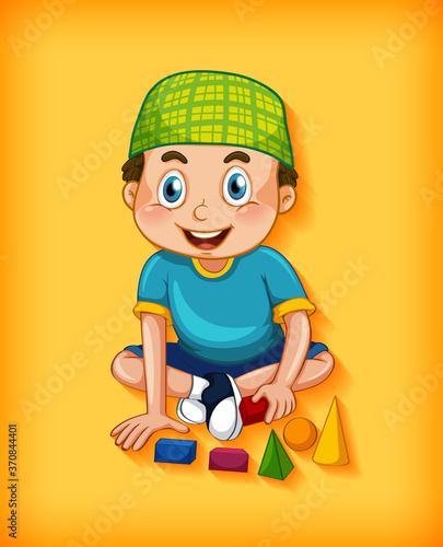 Boy playing toys on yellow background
