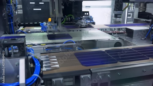 Robotic Solar Cell Stringing System Aligning and Soldering Silicon Photovoltaic Cells with Copper Ribbons on Automated PV Module Assembly Line