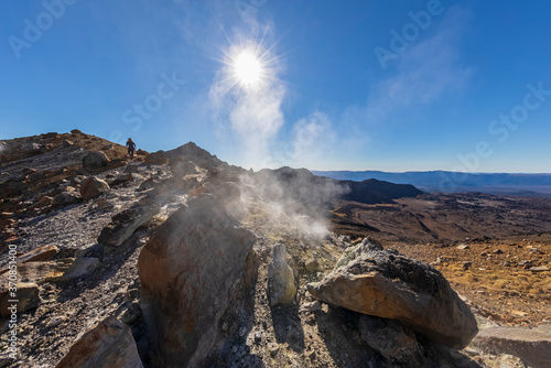 New Zealand, North Island, Sun shining over fumaroles in North Island Volcanic Plateau photo