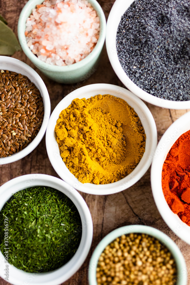 Bowls of curry assorted seeds and spices Bowls of curry assorted seeds and spices