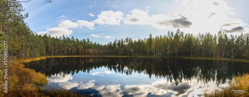 Fototapeta Naklejka Na Ścianę i Meble -  lake, water, forest, nature, landscape, sky, reflection, tree, autumn, pond, blue, trees, summer, river, clouds, mountain, cloud, grass, green, mirror, fall, outdoors, wood, scenic, spring