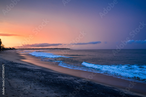 Beautiful sunset over the sea, orange sky. Arugam bay, Ceylon. panoramic format © mathilde