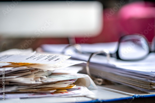 Binder with various receipts and documents photo