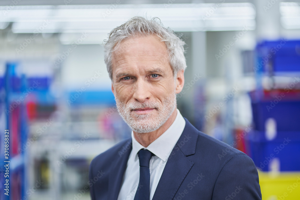 Confident male manager in factory Confident male manager in factory
