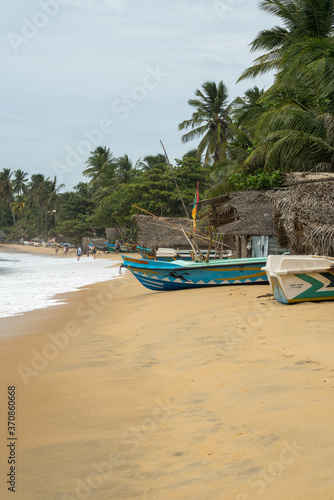 colorful fishing boats on the beach, Arugam Bay, Sri Lanka