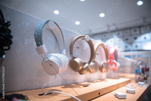 Modern headphones in store photo