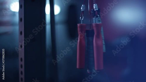 A Set Of Jumping Rope Handles Hanging In A Home Gym 
