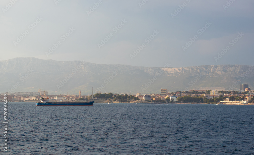 Oil tanker anchored in the area in front of Split, Croatia harbour, town seen in the distance. Second largest city in the republic of croatia