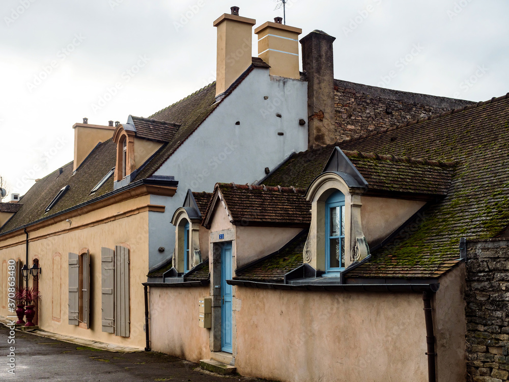 Beautiful ancient architecture of Burgundy. Streets of the city of Beaune. Sunny spring day. Advertising tourist types. Beautiful ancient architecture of Burgundy. Streets of the city of Beaune. Sunny spring day. Advertising tourist types.