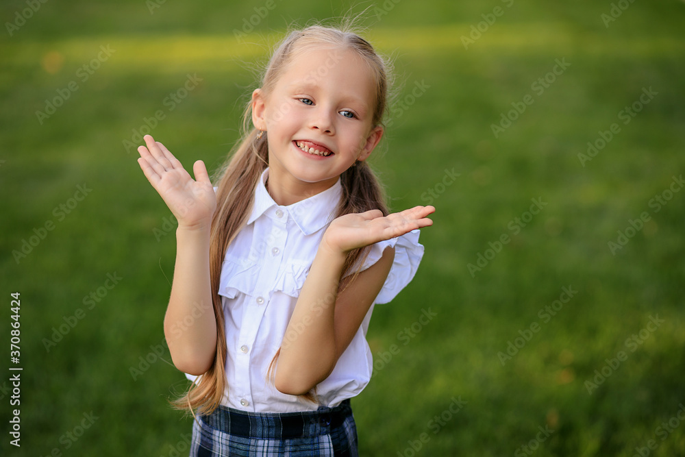 Portrait of a happy first grader schoolgirl Portrait of a happy first grader schoolgirl