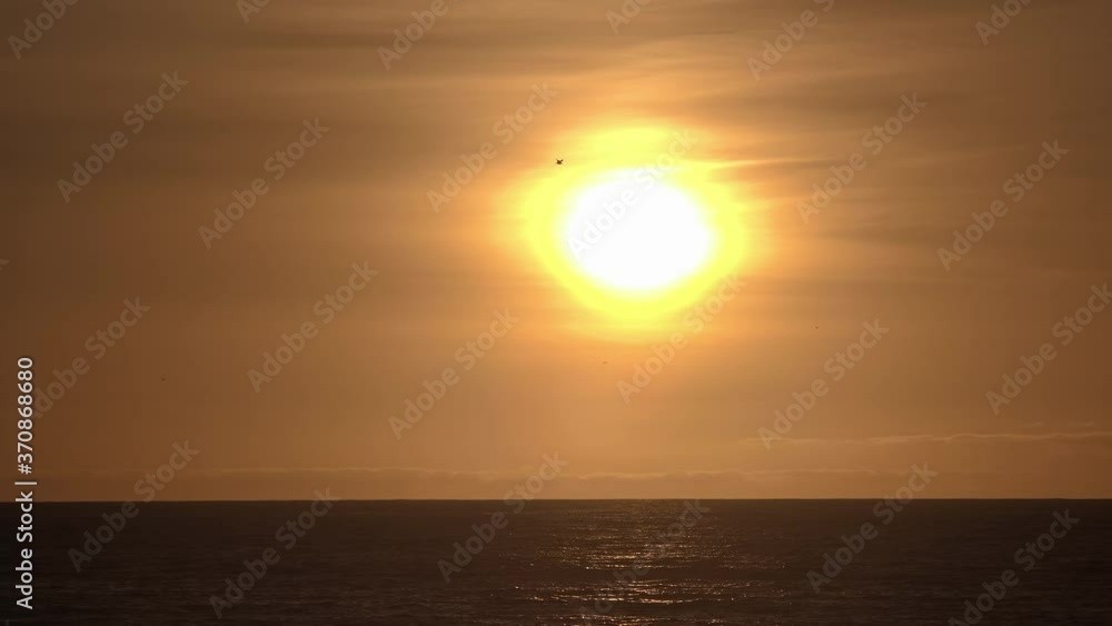 A Quiet Beautiful Sunset over the Ocean A Quiet Beautiful Sunset over the Ocean