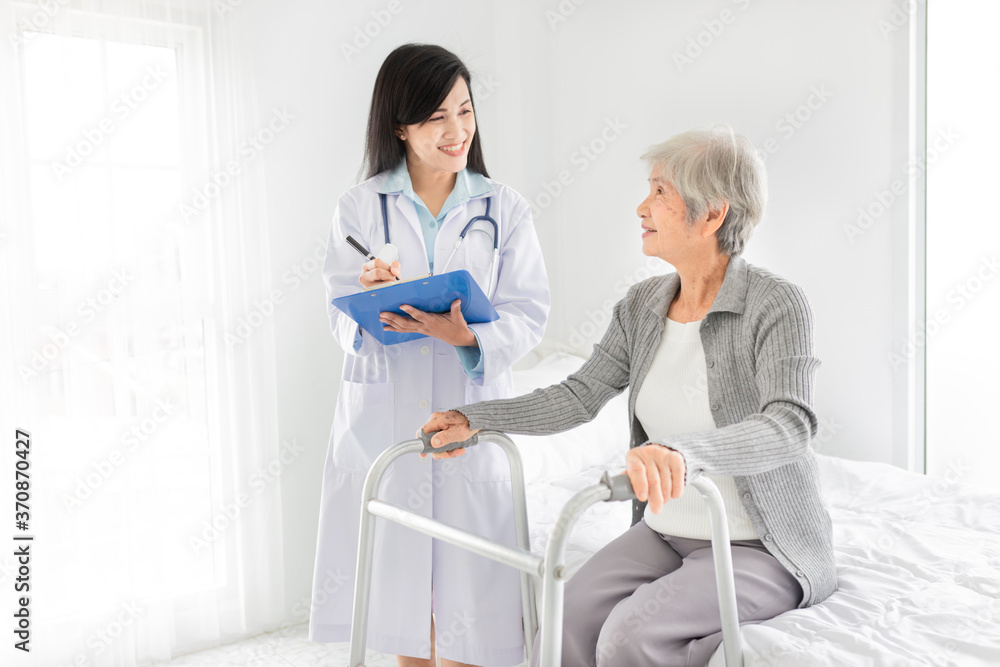 walk training and rehabilitation process, old asian stroke patient learning to use walker with female asian doctor, elderly healthcare promotion, doctor order and explain, happiness hospital walk training and rehabilitation process, old asian stroke patient learning to use walker with female asian doctor, elderly healthcare promotion, doctor order and explain, happiness hospital