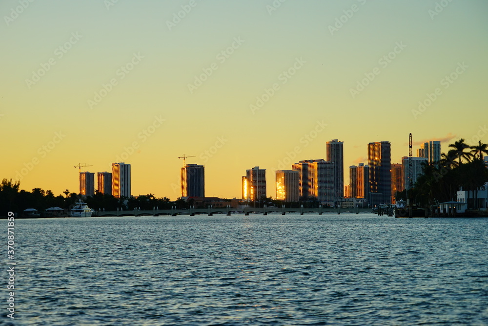 Miami beach skyscrapers at sun set	