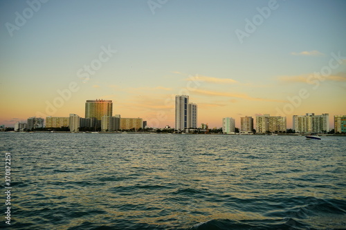 Miami downtown and beach at sun set  © Feng