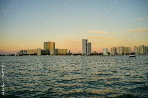 Miami downtown and beach at sun set © Feng