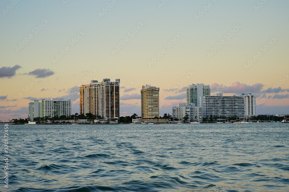 Miami beach skyscrapers at sun set	