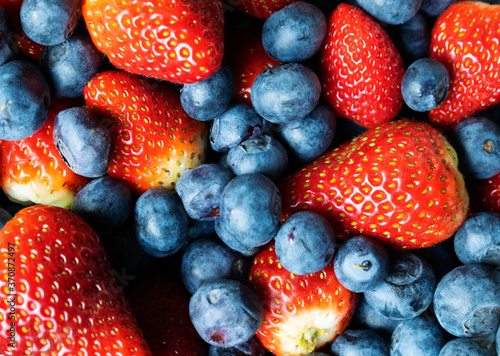 Close up strawberries and  blueberries