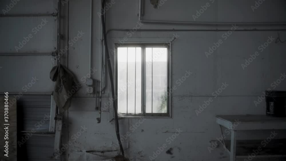 Window in abandoned Suburban Chicago warehouse Window in abandoned Suburban Chicago warehouse