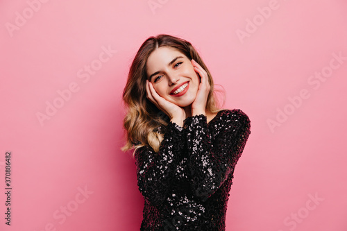 Pleased good-looking woman posing with sincere smile. Indoor portrait of cute european girl isolated on pink background. © Look!