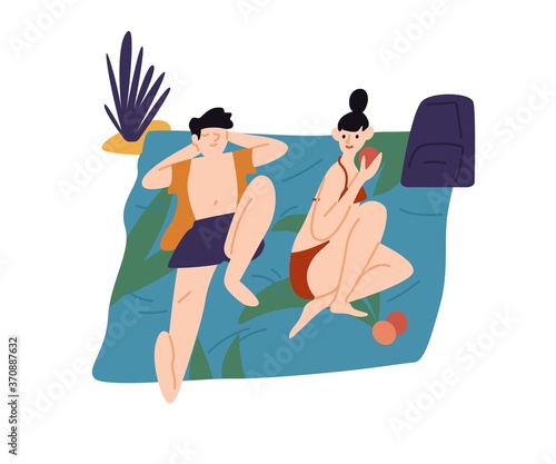 Relaxing people, sunbathing couple on beach. Young woman, man eating, chillin...