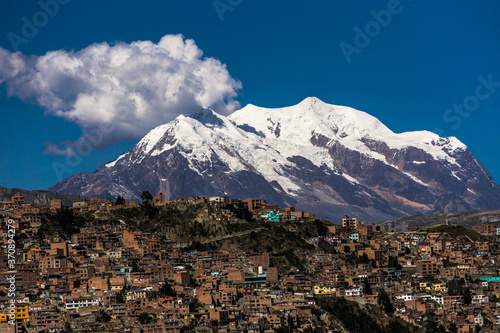 El Alto, La Paz, Bolivia. May, 21, 2019: View of the city of El Alto. Located at more than 4000 meters above sea level with the Andes Mountains in the background. photo