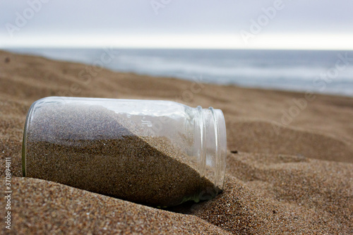 glass jar on the beach