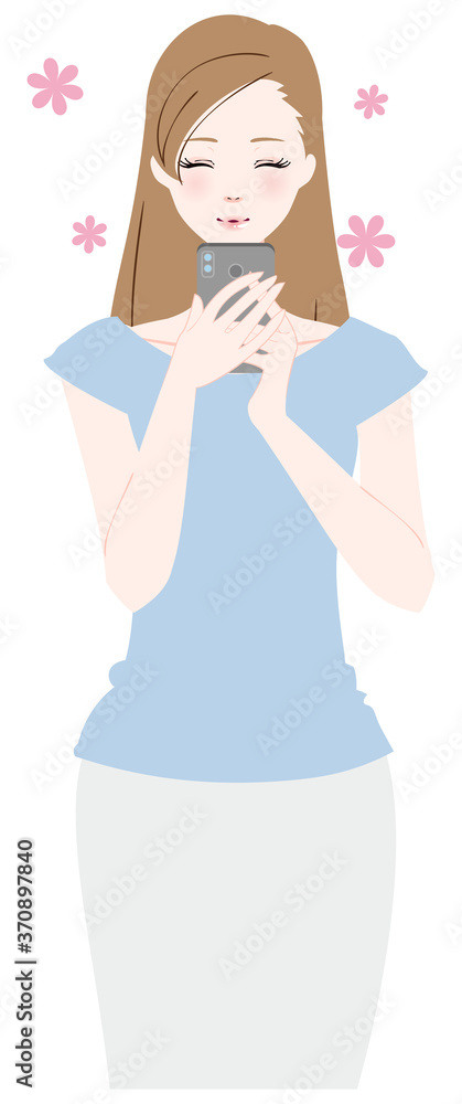 楽しそうにスマホを見る女性 楽しそうにスマホを見る女性