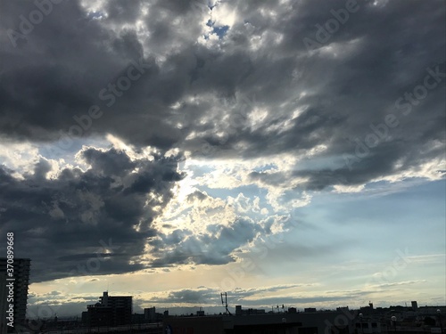 夕陽と雲 © 武司 山本