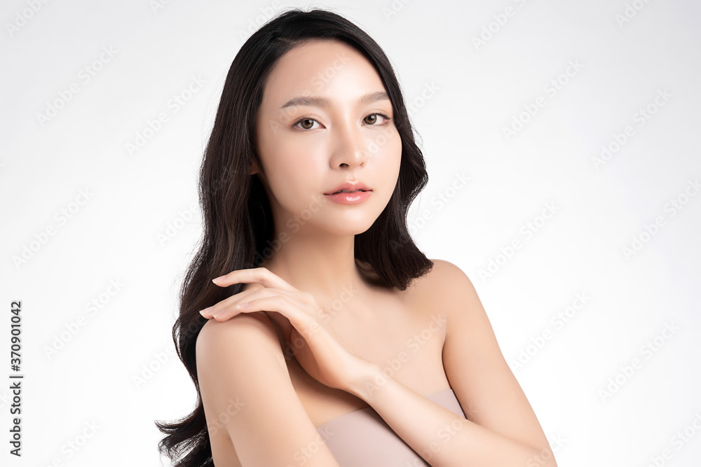 Beautiful Young asian Woman with Clean Fresh Skin, on white background, Face care, Facial treatment, Cosmetology, beauty and spa, Asian women portrait Beautiful Young asian Woman with Clean Fresh Skin, on white background, Face care, Facial treatment, Cosmetology, beauty and spa, Asian women portrait
