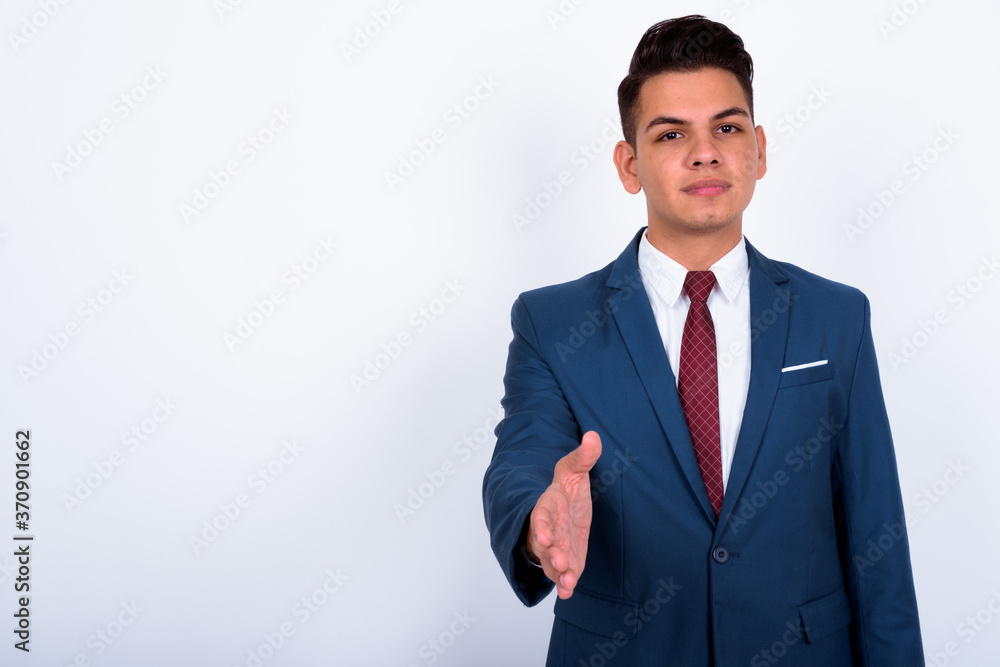 Portrait of young handsome multi ethnic businessman in suit Portrait of young handsome multi ethnic businessman in suit