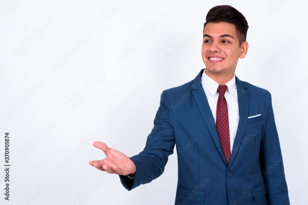 Portrait of happy young handsome multi ethnic businessman in suit Portrait of happy young handsome multi ethnic businessman in suit