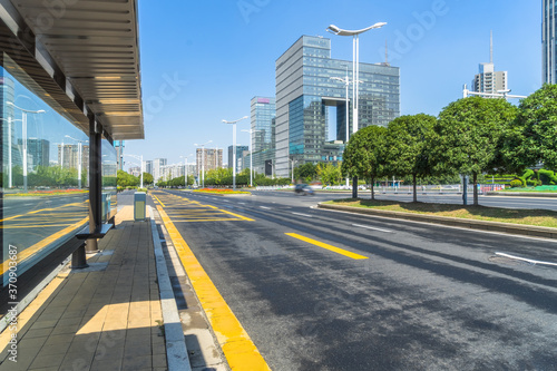 cityscape and skyline of nanjing from empty asphalt road