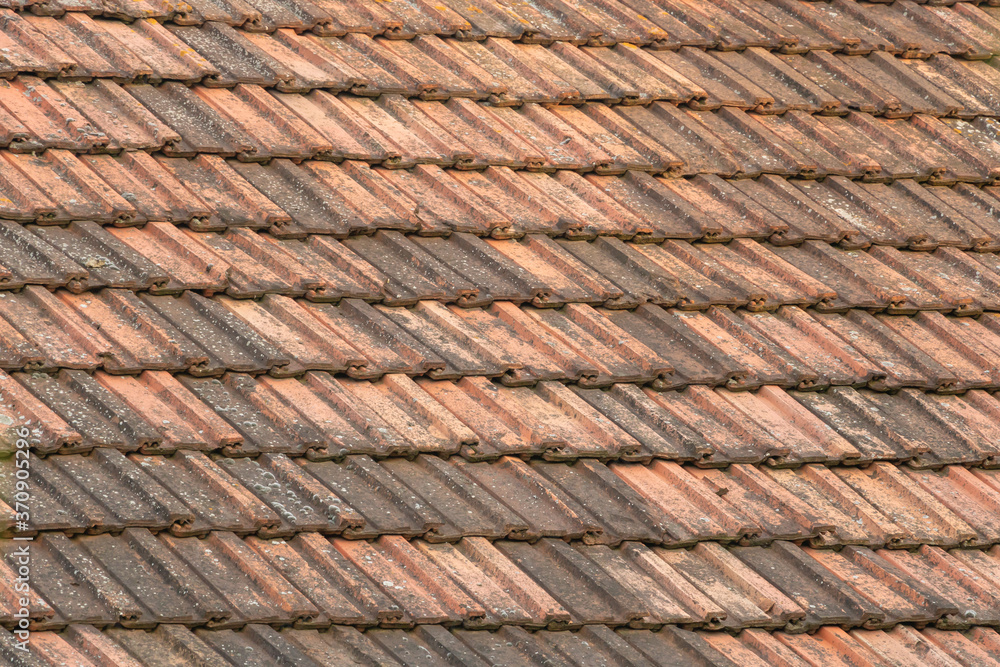Background of old roof tiles, brown clay roof tiles Background of old roof tiles, brown clay roof tiles
