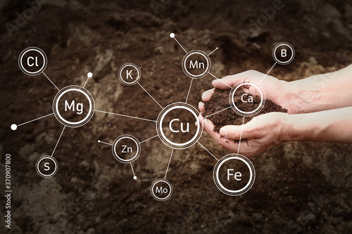 Man with heap of rich soil outdoors, closeup photo