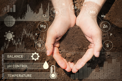 Agronomist with handful of ...