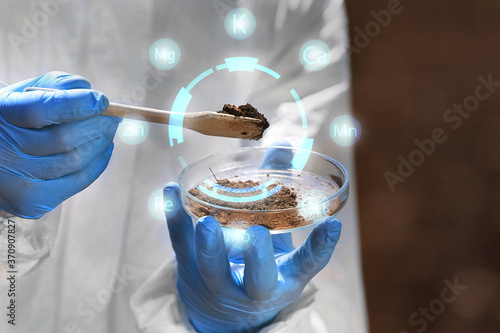 Scientist studying samples ...