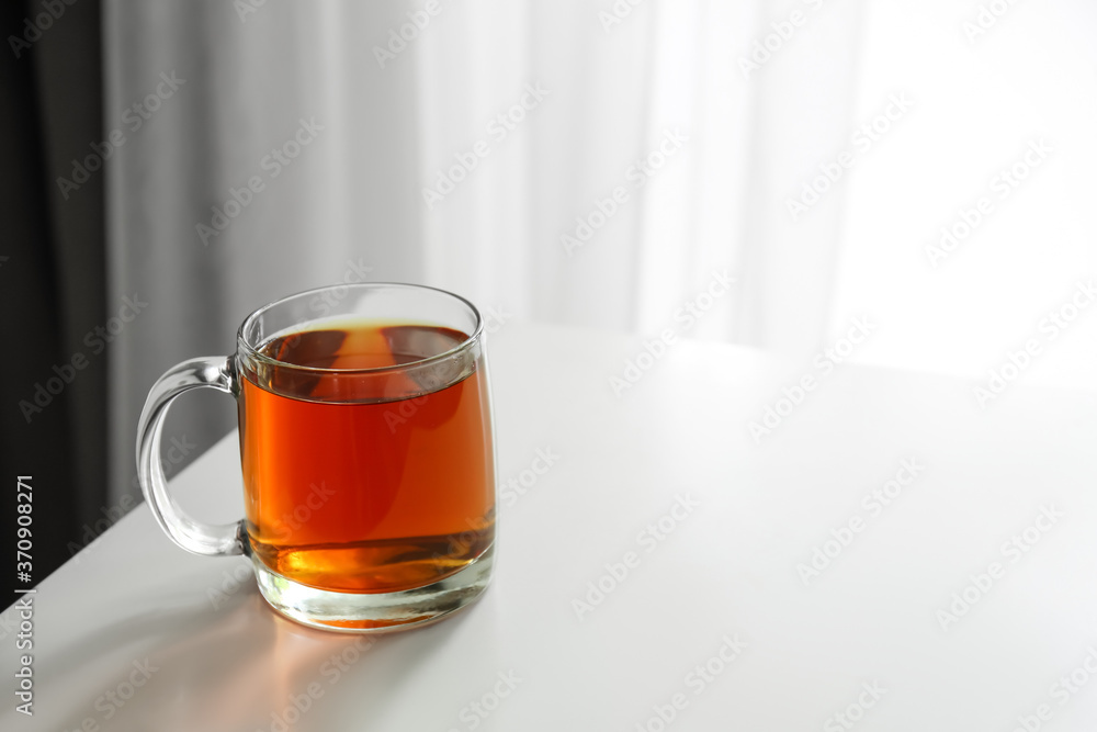 Cup of hot tea on table Cup of hot tea on table