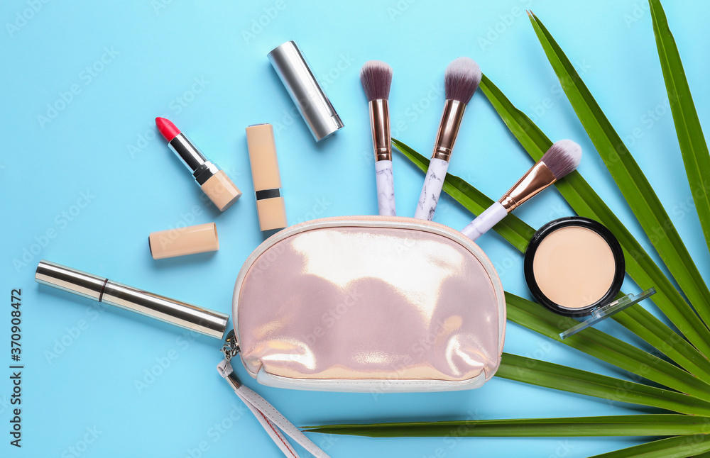 Composition with cosmetic bag on color background Composition with cosmetic bag on color background