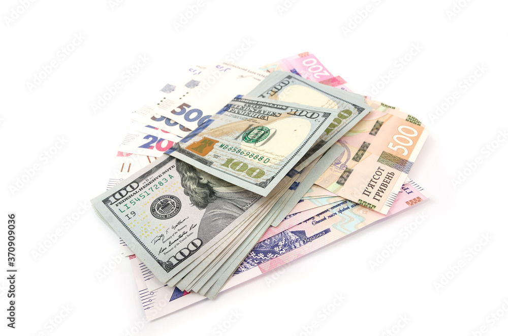 dollars and hryvnia isolated on white background. dollars and hryvnia isolated on white background.