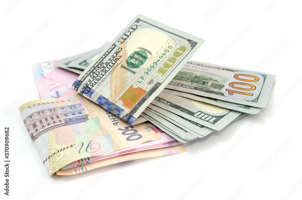 dollars and hryvnia isolated on white background. dollars and hryvnia isolated on white background.
