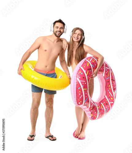 Young couple with headphone...