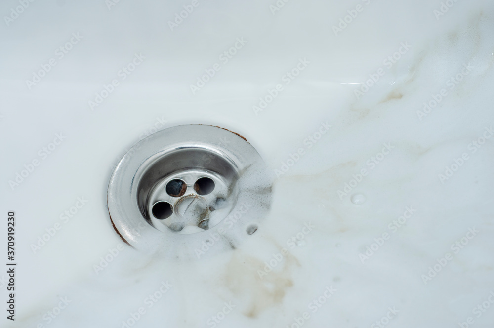 Photo before and after washing off the detergent foam from the surface of the sink Photo before and after washing off the detergent foam from the surface of the sink