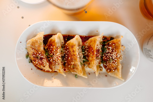 Cooked japanese gedza dumplings with soy sauce