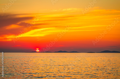 Sea landscape at sunset from Primosten town, a popular tourist destination on the Dalmatian coast of Adriatic sea in Croatia, Europe.