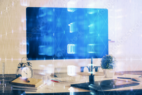 Double exposure of desktop with computer on background and tech theme drawing. Concept of big data.