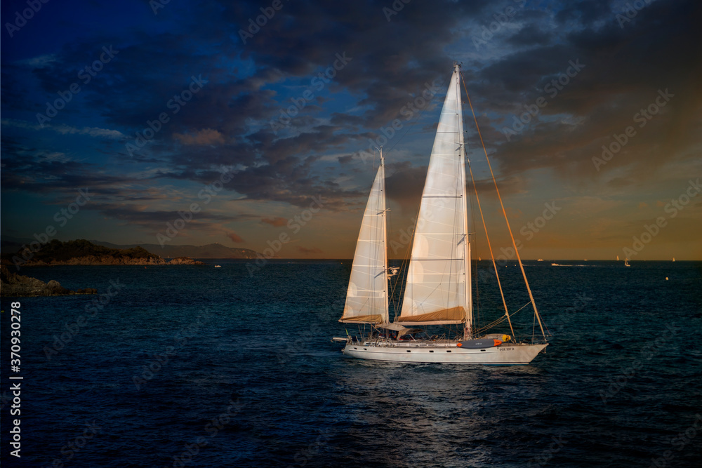 Sailing peacefully in the sunset