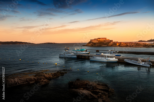 Harbor at the sunset in Hyeres, France photo