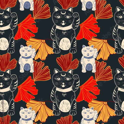 Cute traditional japanese pattern with maneki neko and ginko biloba leaves.